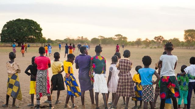 People in a field in Africa
