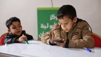 Khalil (8) play EduApp4Syria games