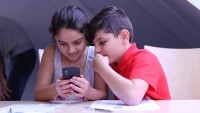 Rawan (8) and Rashed (10) are testing the EduApp4Syria - free, engaging games that will help Syrian children learn to read