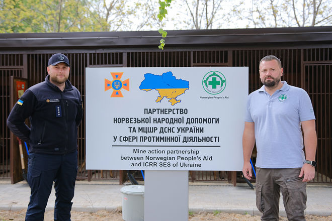 Dmytro and NPA technical advisor Vedran posing at SESU's canine centre in Romny, October 2023.