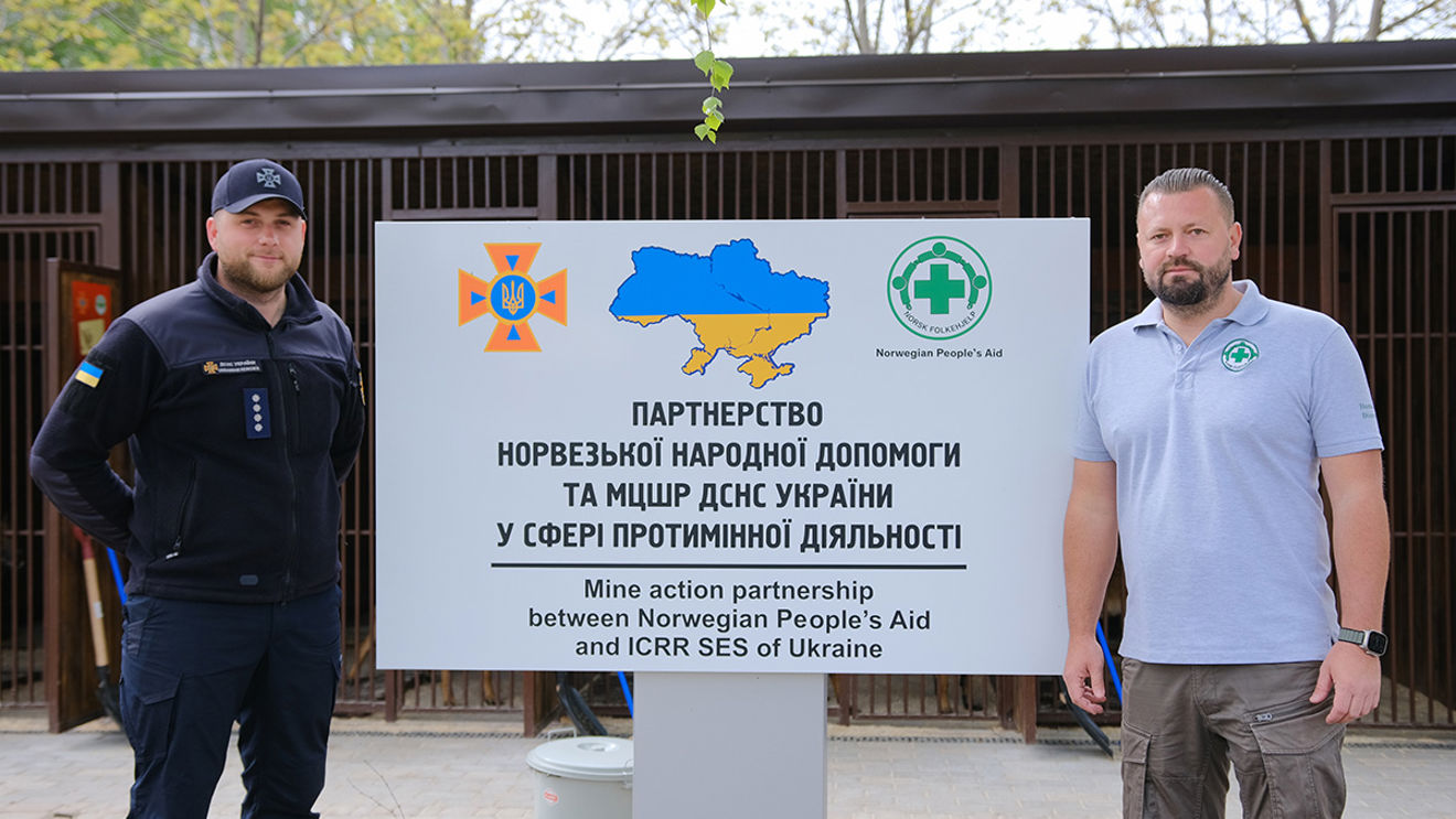 Dmytro and NPA technical advisor Vedran posing at SESU's canine centre in Romny, October 2023.